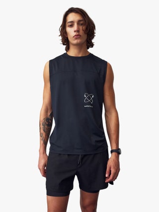 Image may contain Person Skin Tattoo Clothing Shorts and Tank Top