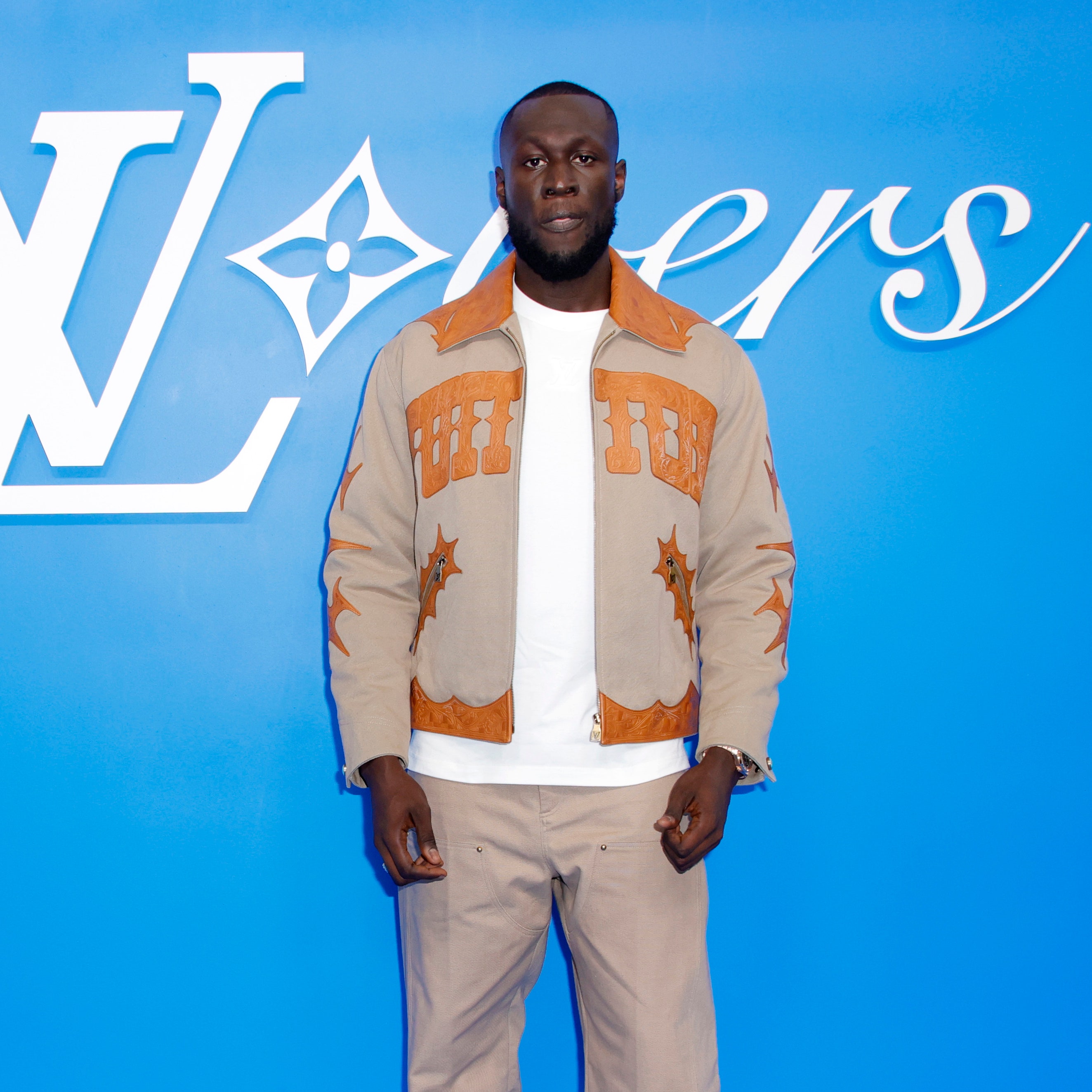 Stormzy made workwear look kinda romantic at the Louis Vuitton show