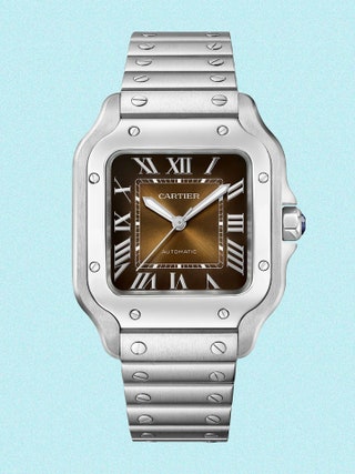 Image may contain Wristwatch Arm Body Part and Person