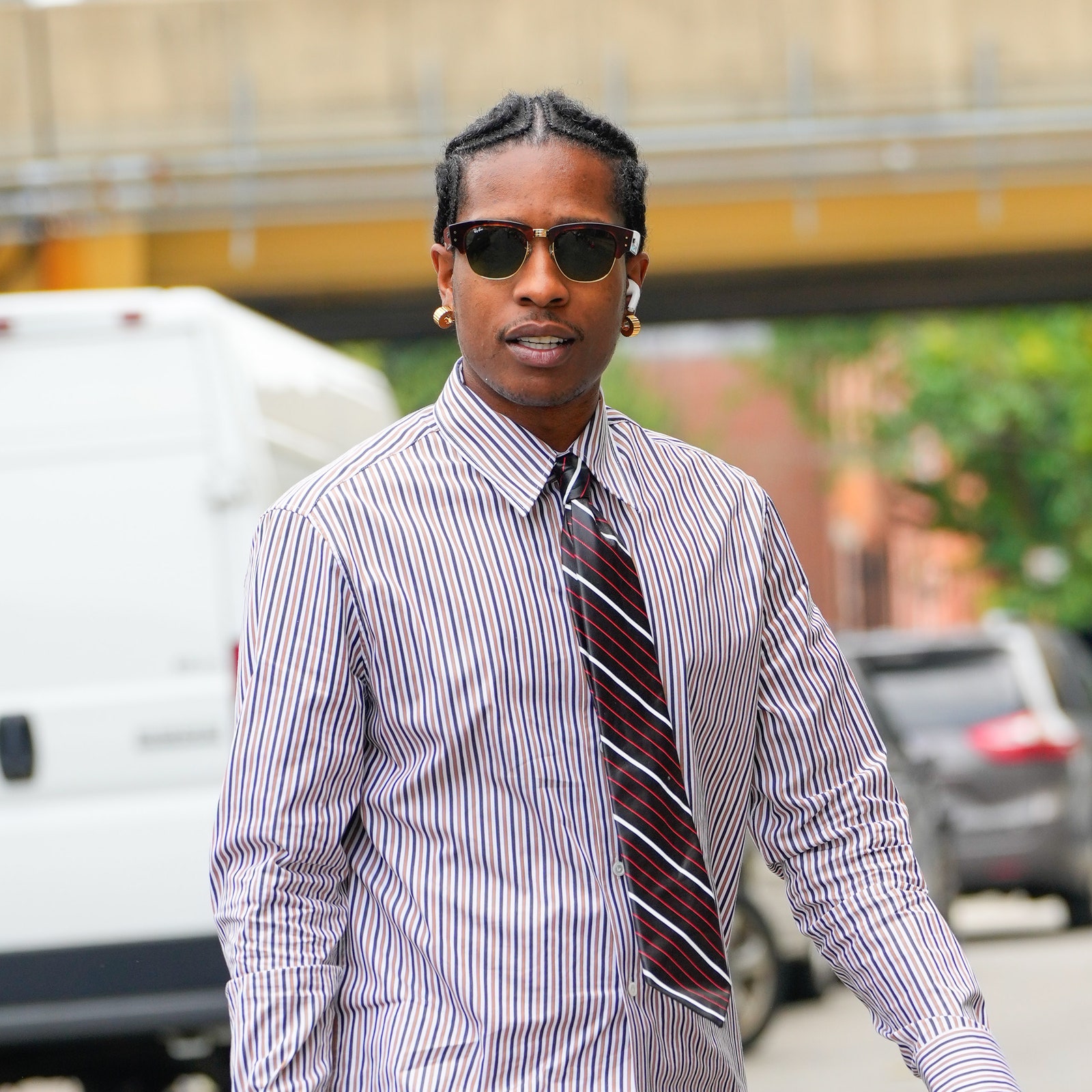 A$AP Rocky, a very good rapper, is alter-egoing as a very cool office worker