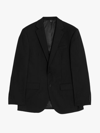 Image may contain Blazer Clothing Coat Jacket Formal Wear and Suit