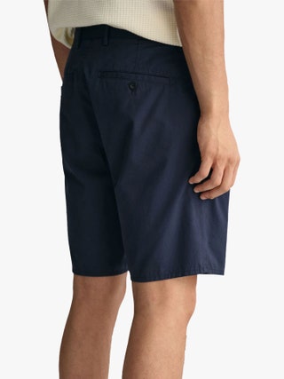 Image may contain Clothing Shorts Adult and Person