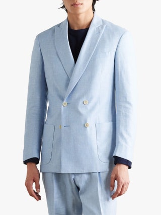 Image may contain Blazer Clothing Coat Jacket Formal Wear and Suit