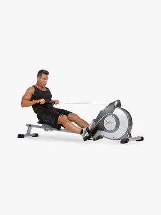 Image may contain Adult Person Working Out Fitness Sport Gym Rowing Machine Clothing Footwear and Shoe