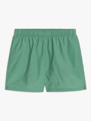 Image may contain Clothing Shorts Skirt and Swimming Trunks