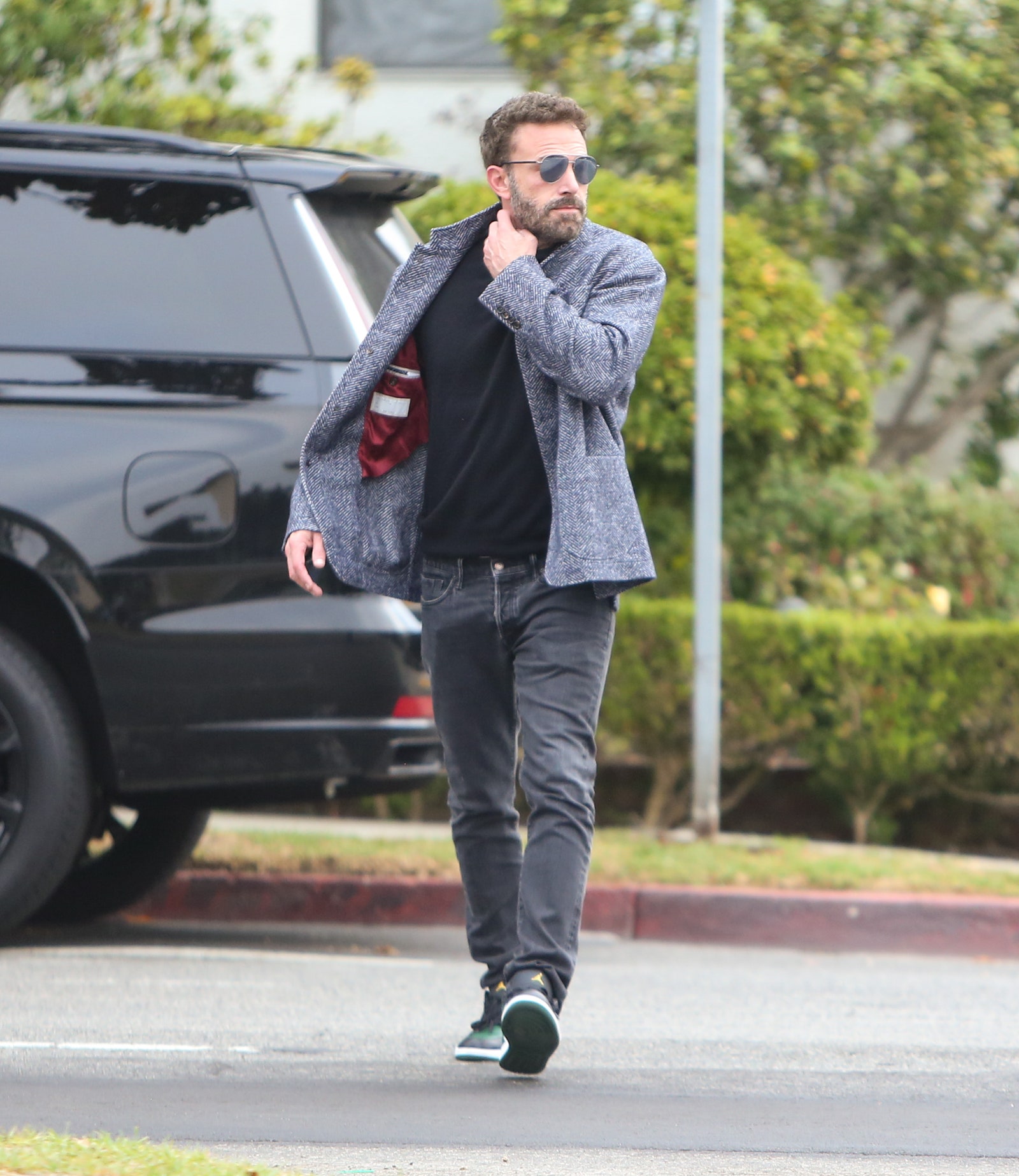 Ben Affleck usando los Air Jordan 1 Low “Green Toe”.