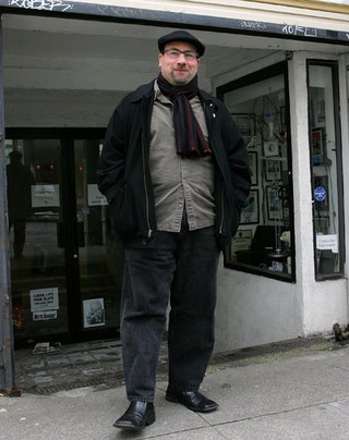 Image may contain Craig Newmark Clothing Apparel Coat Jacket Human Person Pants and Overcoat