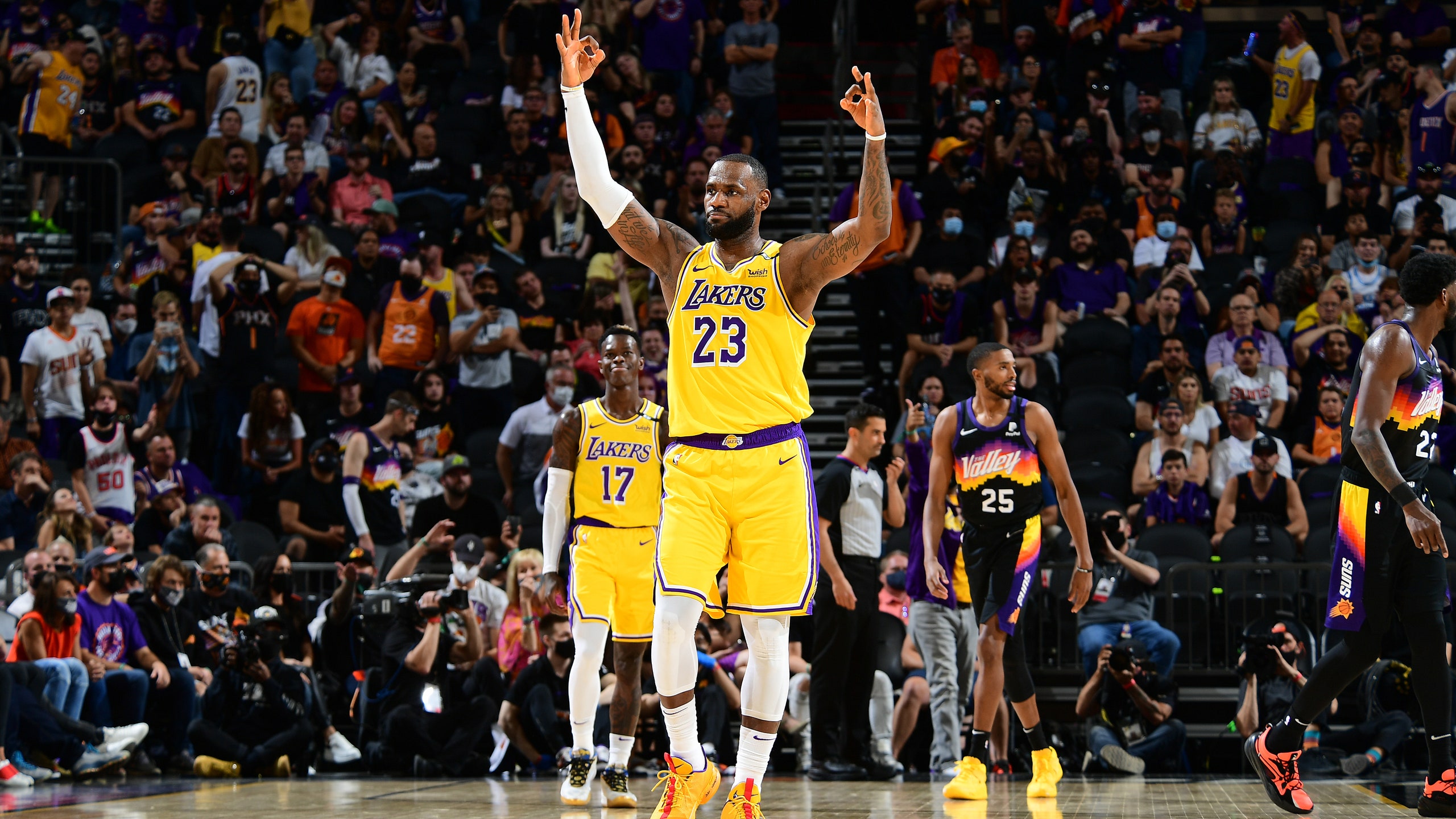 LeBron James 23 of the Los Angeles Lakers reacts to a play against the Phoenix Suns during Round 1 Game 2 of the 2021...