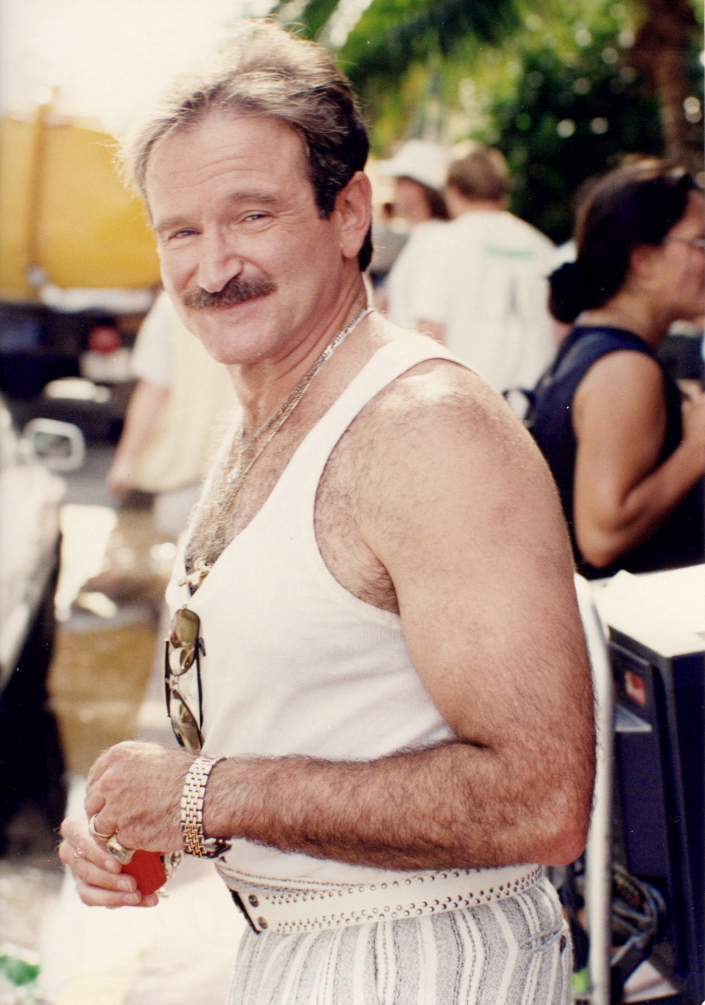 Image may contain Robin Williams Accessories Jewelry Necklace Face Head Person Photography Portrait and Body Part