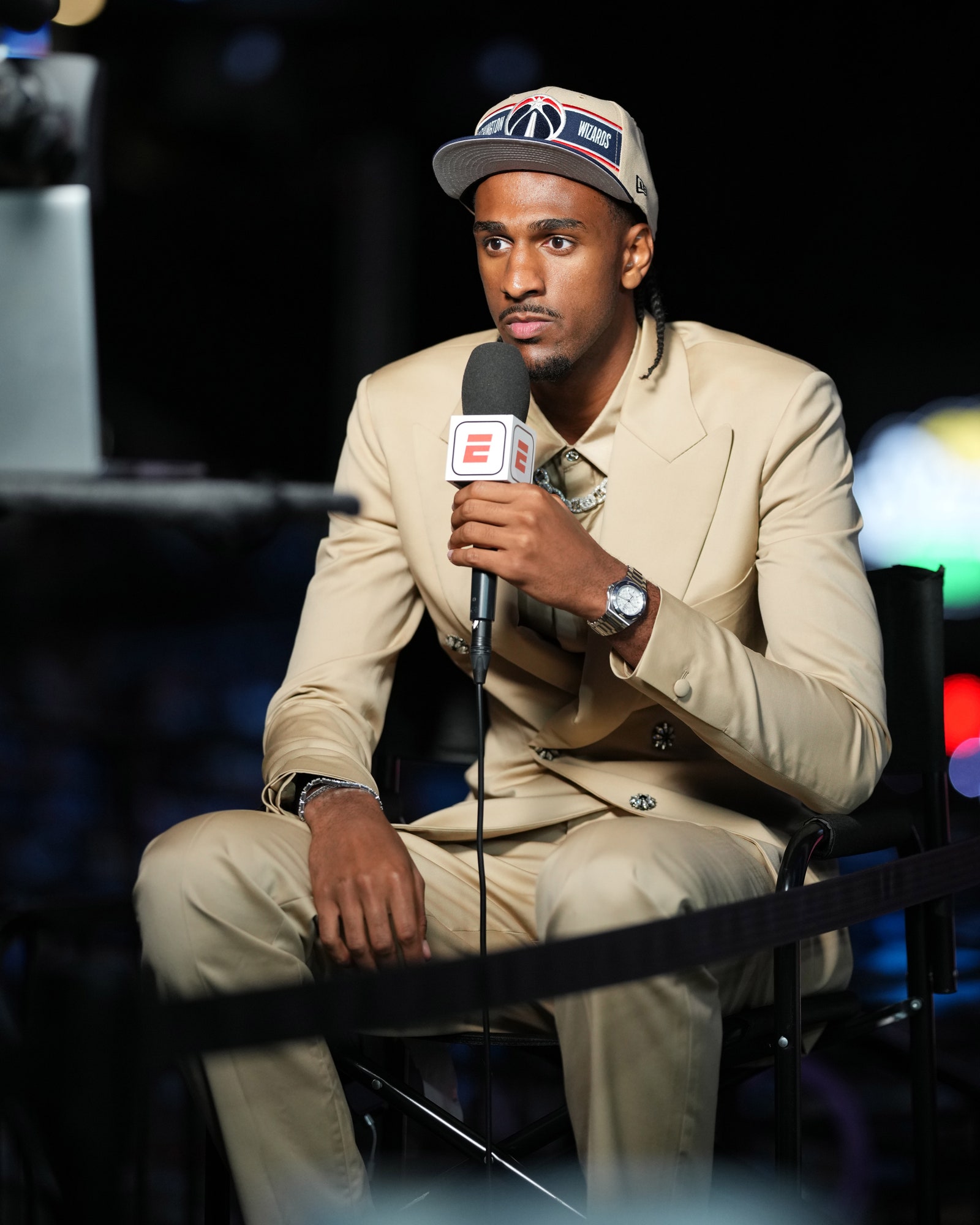 Alex Sarr talks to media after being drafted second overall pick by the Washington Wizards during the first round during...