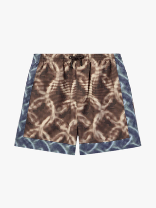 Image may contain Clothing Shorts Skirt and Swimming Trunks