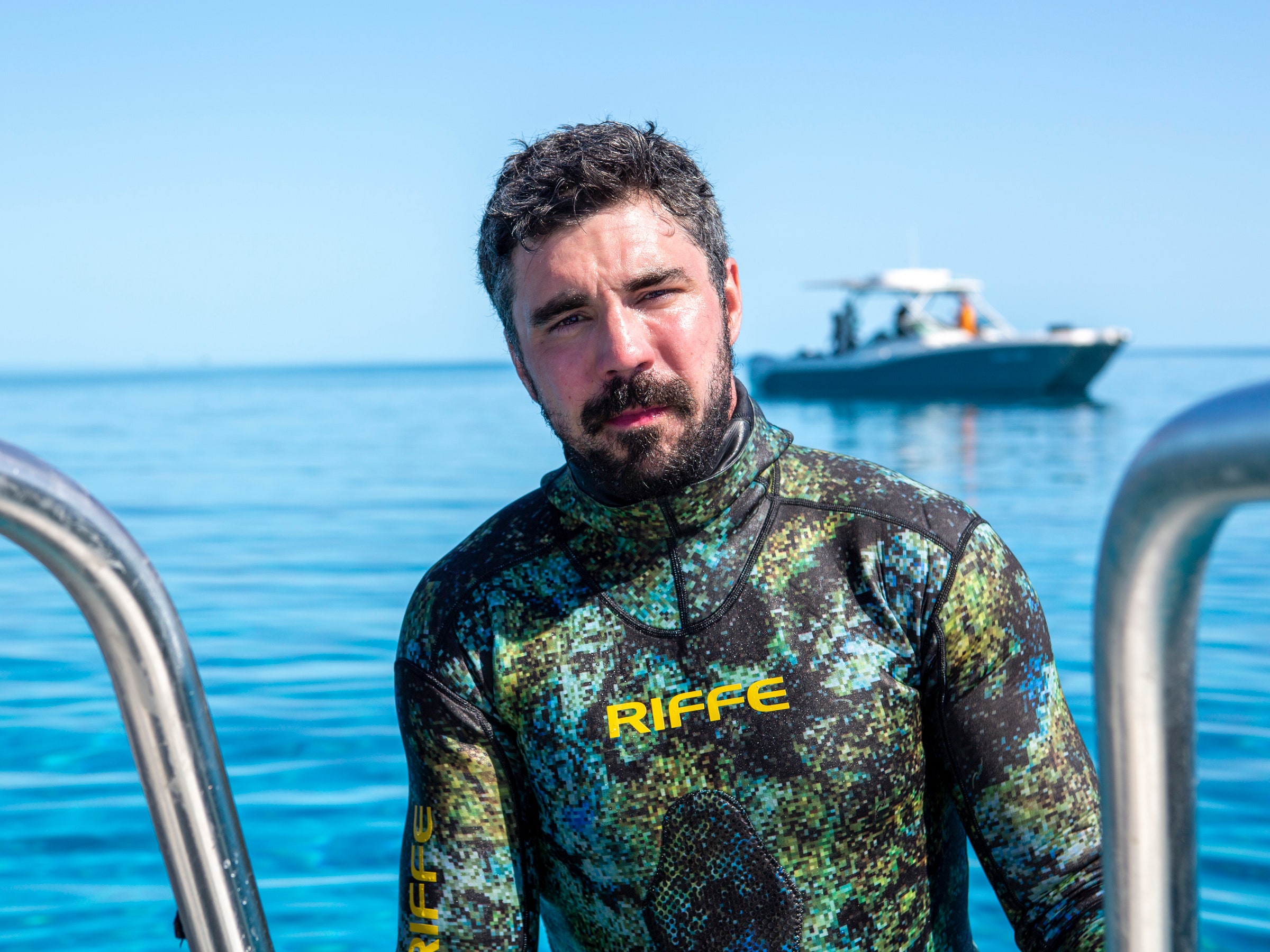 Talking Shark Week 2024 With Marine Biologist Austin Gallagher, Who's Studied Great Whites From Inside a Fake Whale Carcass