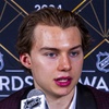 Chicago Blackhawks forward Connor Bedard speaks with the media after winning the Calder Memorial Trophy at hockey's NHL Awards, Thursday, June 27, 2024, in Las Vegas. 


