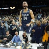 Yale guard Yassine Gharram (24) stands on a table after celebrating with fans after Yale upset Auburn in a first-round college basketball game in the NCAA Tournament in Spokane, Wash., Friday, March 22, 2024. 


