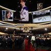 Trevor Connelly heads to the stage after being selected by the Vegas Golden Knights during the first round of the NHL hockey draft Friday, June 28, 2024, in Las Vegas. 