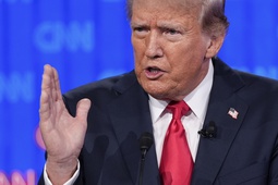 Republican presidential candidate former President Donald Trump gestures during a presidential debate with Joe Biden, Thursday, June 27, 2024, in Atlanta. 


