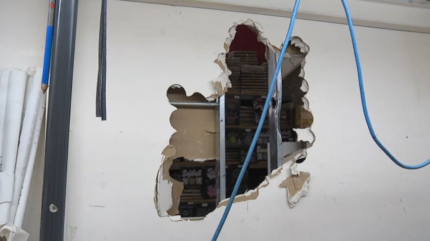 A hole was smashed in a wall during a burglary at a downtown Los Angeles business.