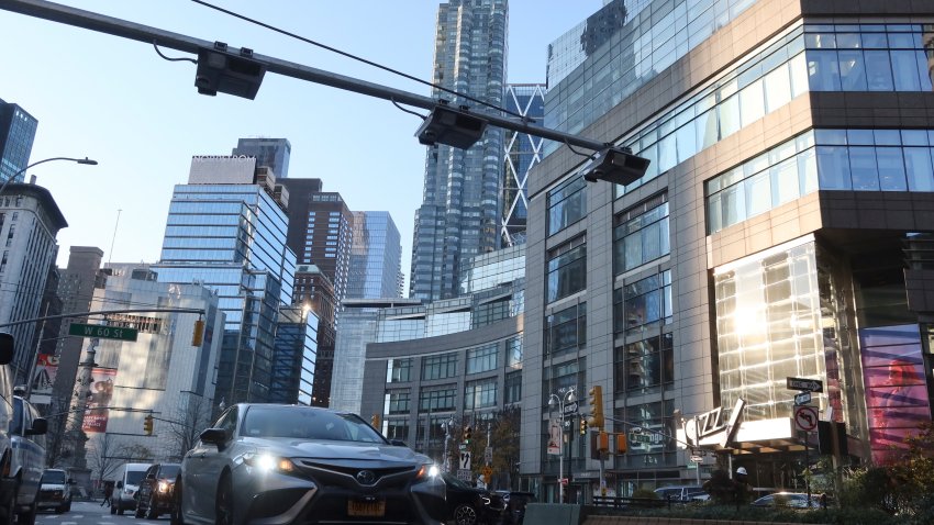 NEW YORK, NY – NOVEMBER 30: Congestion pricing toll readers hang above Broadway in Columbus Circle on November 30, 2023, in New York City.