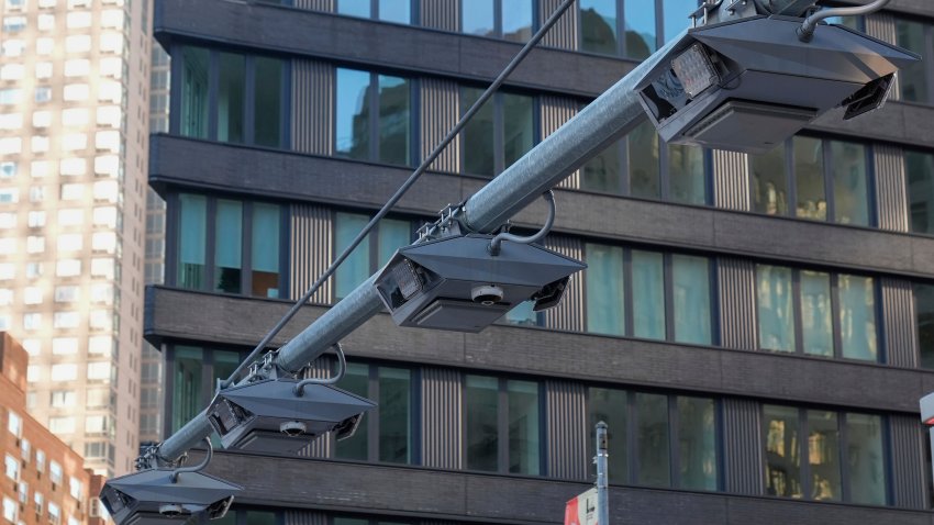 Electronic toll scanners hang above Broadway near Columbus Circle Wednesday, Feb. 7, 2024, in New York. (AP Photo/Frank Franklin II)