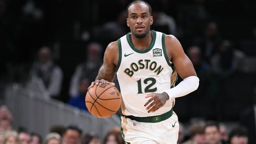 Apr 7, 2024; Boston, Massachusetts, USA; Boston Celtics forward Oshae Brissett (12) moves the ball against the Portland Trail Blazers during the second half at TD Garden. Mandatory Credit: Eric Canha-USA TODAY Sports