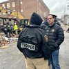 Governor Shapiro with first responders at West Reading factory explosion site.