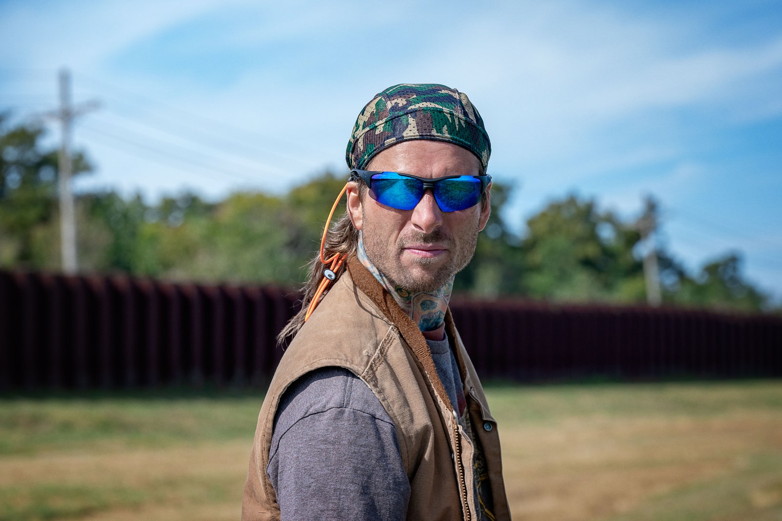 Image may contain Glen Powell Accessories Sunglasses Photography Face Head Person Portrait Glasses Adult and Cap