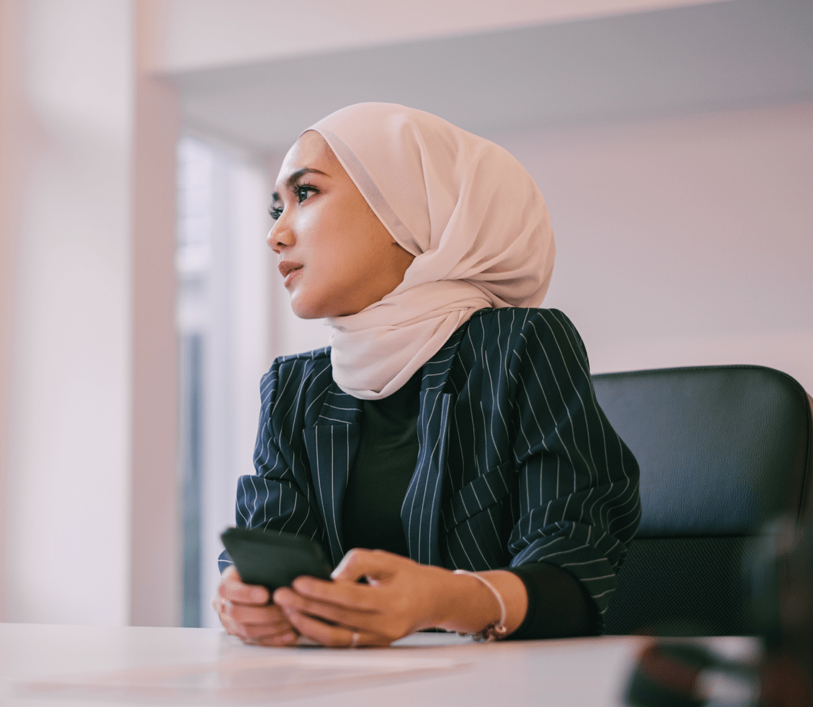 Young woman with hijab in office setting