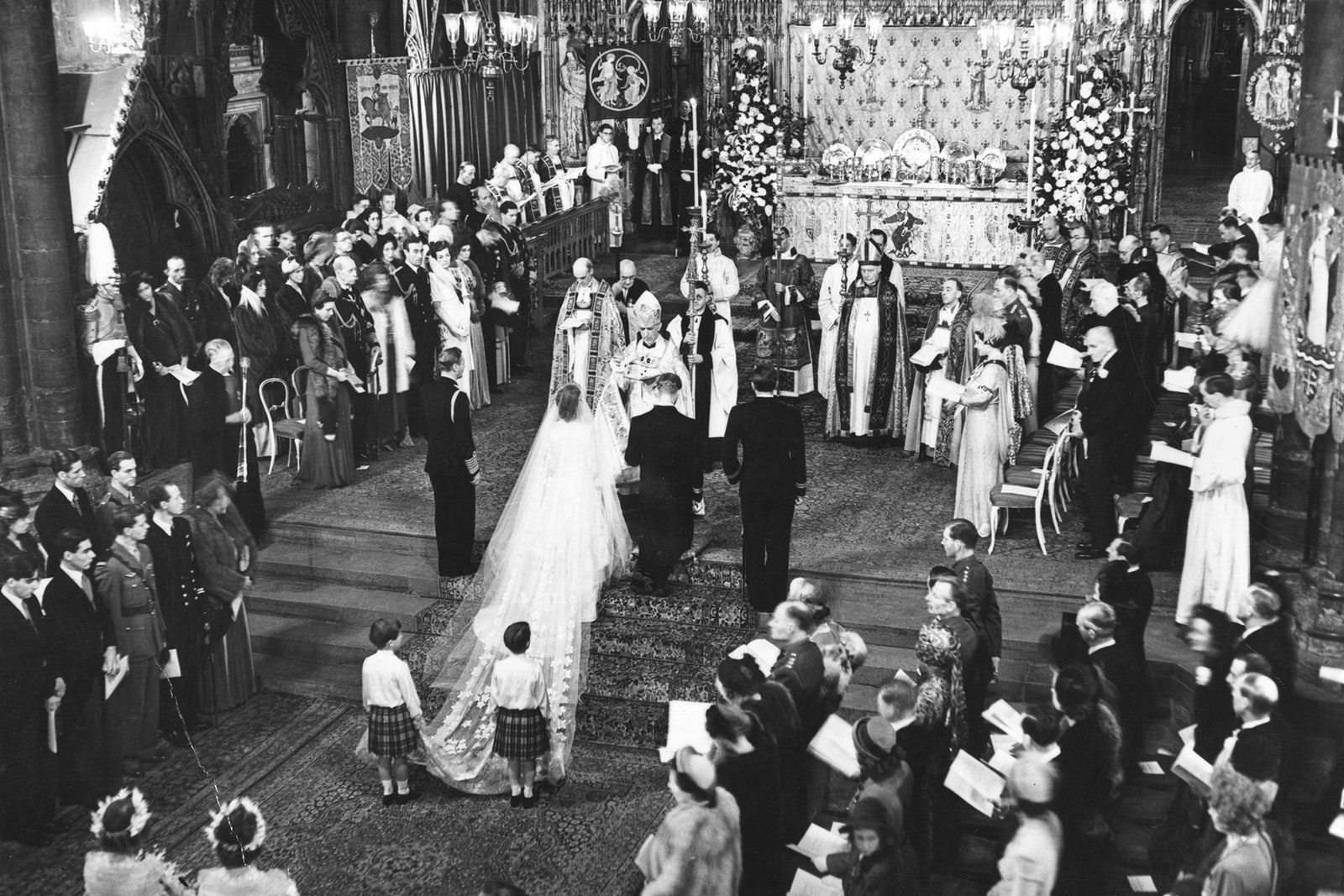 Princess Elizabeth and Prince Philip receiving the blessing of the Archbishop of Canterbury during their wedding ceremony