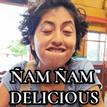 a woman is making a funny face with the words nam nam delicious behind her