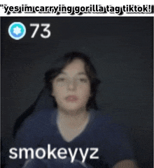 a blurred image of a person with the name smokeyyz