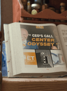 a book is open to a page that says " ceo 's call center odyssey " on it