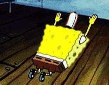 a cartoon of spongebob laying on the floor with his hands up