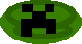 a pixel art of a creeper face on a green oval .