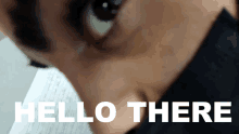 a close up of a person 's face with the words hello there written below it