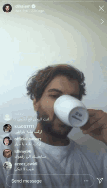 a man drinking from a white cup with the word dihaiem on the bottom right