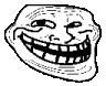 a black and white drawing of a troll face with a big smile on it .