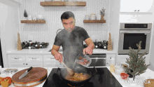 a man is pouring water into a wok with a wooden spoon and the words made in animatica on the bottom