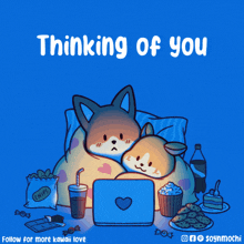 a cartoon of two dogs sitting in front of a laptop with the words thinking of you below them