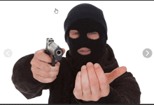 a man wearing a mask is pointing a gun at the camera and giving the middle finger