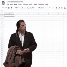 a man in a suit is standing in front of an untitled spreadsheet page