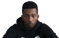 a man wearing a black hoodie with a white letter t on it