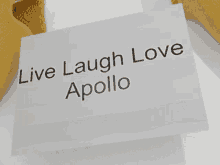 a card with the words live laugh love apollo on it