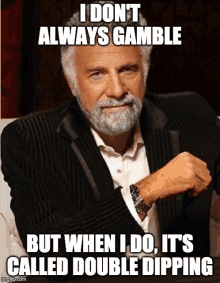 a man with a beard is wearing a suit and a watch and says i don 't always gamble