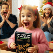 a little girl is holding a book called the wretched of the earth by franz fanon