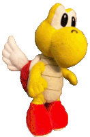 a yellow and white stuffed animal with red feet and wings