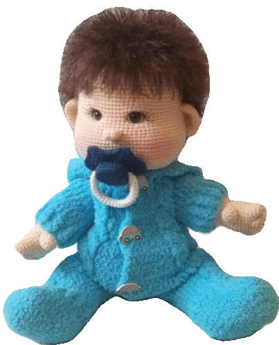 a baby doll with a pacifier in its mouth