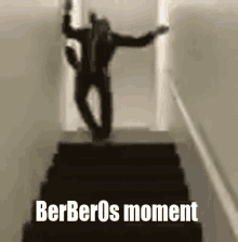 a man is walking down a set of stairs with the words berberos moment below him