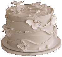 white cake with butterflies and pearls on it