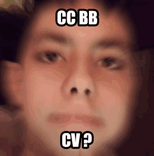 a blurry picture of a man 's face with cc bb cv written on the top