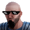 a man with a beard is wearing sunglasses .